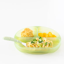 Load image into Gallery viewer, Bumkins Silicone Grip Dish: Green Jelly holds pasta, broccoli, mandarins, and cornbread with a fork on a white background.
