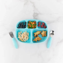 Load image into Gallery viewer, Bumkins Silicone Grip Dish with Lid (5 Section): Blue holds berries, veggies, dino nuggets, &amp; chicken on a marble surface near blue utensils.
