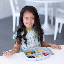 Load image into Gallery viewer, A young girl with long hair at a white table, enjoying fruits and veggies from a Bumkins Silicone Grip Dish with Lid (5 Section): Gray.
