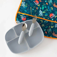 Load image into Gallery viewer, Bumkins Silicone Grip Dish with Lid (5 Section): Gray sits with gray utensils on top near an animal-patterned bib on a white background.
