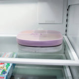 Bumkins Silicone Grip Dish with Lid (5 Section): Lavender sits on top of another similar dish on a refrigerator shelf.