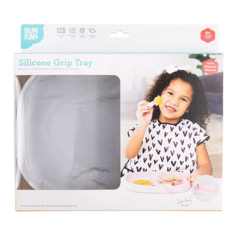 Bumkins Silicone Grip Tray: Marble in a white packaging box with a photo of a child and a clear window partially displaying the dish.