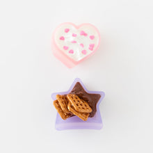 Load image into Gallery viewer, Bumkins Silicone Little Dipper Combo 2 Pack: Magenta Jelly holds yogurt and pretzels &amp; chocolate on a white background.
