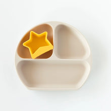 Load image into Gallery viewer, A yellow Bumkins Silicone Little Dipper 3-Pack: Tutti-Frutti sits in a sectioned beige plate on a white background.
