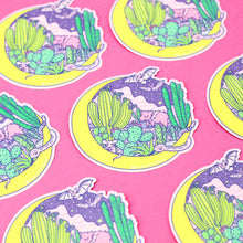 Load image into Gallery viewer, Turtle Soups Desert Moon Vinyl Sticker features pastel cacti, a crescent moon, and a lizard on pink; its scratch-resistant and neatly patterned.
