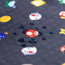 Load image into Gallery viewer, Close-up of water droplets on Bumkins Splat Mat: Super Mario™ Lineup.
