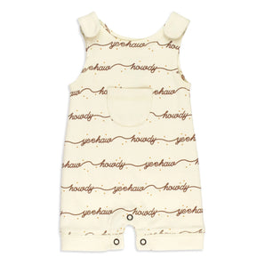 Organic Sleeveless Romper, Howdy: cream sleeveless romper with brown "howdy" & "yeehaw" script pattern; made of 100% organic cotton.