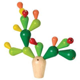 PlanToys Balancing Cactus toy with colorful green, red, yellow pieces on wood base boosts hand-eye coordination.