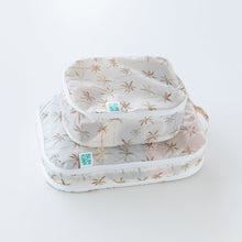 Load image into Gallery viewer, An angled side view of Bumkins Packing Cube 2 Pack: Palm Daze, stacked on a white background.
