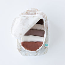 Load image into Gallery viewer, A top down view of Bumkins Packing Cube 2 Pack: Palm Daze stacked on a white background. The top cube is open and holds folded clothes.
