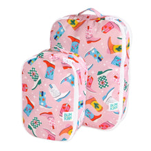 Load image into Gallery viewer, Bumkins Packing Cube 2 Pack: Boots includes two pink waterproof travel bags with a colorful cowboy boot pattern and white zippers.
