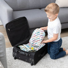 Load image into Gallery viewer, A young boy places Bumkins Packing Cube 2 Pack: Mickey &amp; Friends Varsity into a black suitcase on the living room floor.
