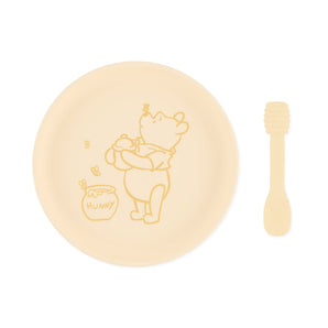 Bumkins Silicone Plate + Spoon Set: Disney Winnie the Pooh includes a silicone plate with a Winnie the Pooh illustration and a matching spoon.