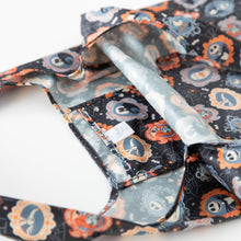 Load image into Gallery viewer, Close-up of Bumkins Packable Tote Bag: Ghostly Gallery on a white background, with focus on the interior pocket.
