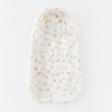 Load image into Gallery viewer, Bumkins Packable Tote Bag: Palm Daze folds itself into its pocket on a white background in a stop motion GIF.
