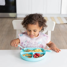 Load image into Gallery viewer, A curly-haired child eats from a blue divided plate at a white table while wearing a Bumkins SuperBib® 3 Pack: Love You Bunches.
