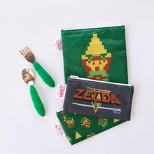 Load image into Gallery viewer, Green utensils sit near Bumkins Reusable Snack Bag, 3-Pack: The Legend of Zelda™ on a white background.
