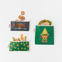 Load image into Gallery viewer, Bumkins Reusable Snack Bag, 3-Pack: The Legend of Zelda™ holds snacks like veggies, pretzels and sandwiches on a white background.
