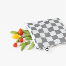 Load image into Gallery viewer, Veggies spill from a Roamio by Bumkins Bumkins Reusable Snack Bag, Large 2 Pack: Double Check on a white background.
