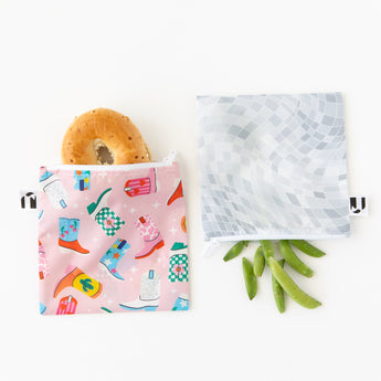 Roamio by Bumkins Reusable Snack Bag, Large 2 Pack: Disco Boots holds a bagel and pea pods on a white background.