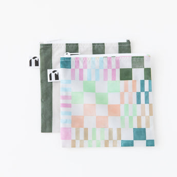 Roamio by Bumkins Reusable Snack Bag, Large 2 Pack: Motley Club lays overlapped on a white background.