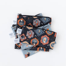 Load image into Gallery viewer, Bumkins Reusable Snack Bag, Large 2 Pack: Everyday Is Halloween lays underneath other bags with matching patterns on a white background.
