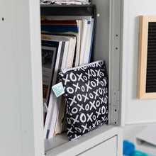 Load image into Gallery viewer, An open locker with books, papers, and a Bumkins Reusable Snack Bag, Large 2-Pack: XOXO &amp; Hearts.
