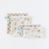Bumkins Reusable Snack Bag, Small 2 Pack: Palm Check lays overlapped on top of another set of similar bags on top of a white background.