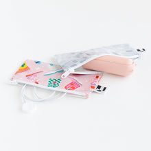 Load image into Gallery viewer, Roamio by Bumkins Reusable Snack Bag, Small 2 Pack: Disco Boots lays on a white background with a white cord &amp; pink container peeking out.
