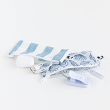 Load image into Gallery viewer, Roamio by Bumkins Reusable Snack Bag, Small 2 Pack: Coastal lays open on a white background with electronics like a book light inside.
