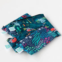 Load image into Gallery viewer, Bumkins Reusable Snack Bag, Small 2-Pack: Jungle &amp; Animal Prints lays stacked on a white background on top of two similar bags.
