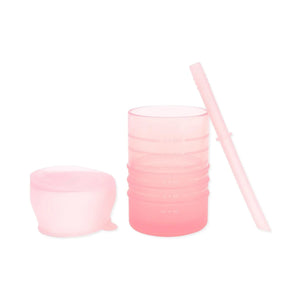 Bumkins Silicone Straw Cup with Lid: Pink is made from LFGB-grade silicone and features a lid and transparent straw, ideal for toddlers.