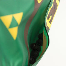Load image into Gallery viewer, Close-up of blueberries on the pocket of a Bumkins Caped SuperBib®: The Legend of Zelda™ Link.
