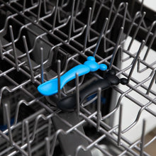 Load image into Gallery viewer, Bumkins Silicone Dipping Spoons: Mickey Mouse (Black and Blue) sit in the top rack of an open dishwasher.
