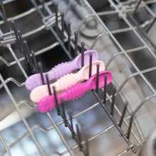 Load image into Gallery viewer, Bumkins Silicone Dipping Spoons 3 Pack: Lollipop sits in the top rack of an open dishwasher.
