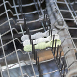 Bumkins Silicone Dipping Spoons 3 Pack: Taffy sits in the top rack of an open dishwasher.