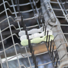 Load image into Gallery viewer, Bumkins Silicone Dipping Spoons 3 Pack: Taffy sits in the top rack of an open dishwasher.
