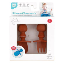 Load image into Gallery viewer, Bumkins Silicone Chewtensils®: Clay are shown in a white packaging box, with a clear front window displaying the product.
