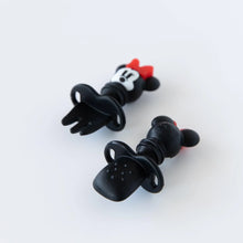 Load image into Gallery viewer, Bumkins Silicone Chewtensils®: Minnie Mouse are displayed on a white background with one face-down, showcasing sensory bumps on the back.
