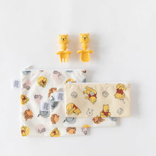 Load image into Gallery viewer, Bumkins Silicone Chewtensils®: Winnie The Pooh sits above 3 colorful waterproof pouches on a white background.
