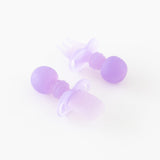 Bumkins Silicone Chewtensils®: Purple Jelly are displayed on a white background with one face-down, showcasing sensory bumps on the back.