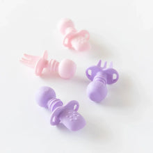 Load image into Gallery viewer, Bumkins Silicone Chewtensils®: Lavender sits next to a set of pink silicone utensils on a white background.
