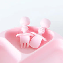 Load image into Gallery viewer, Close-up of Bumkins Silicone Chewtensils®: Pink in an empty section of a pink divided plate on a white background.
