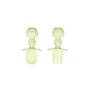 Bumkins Silicone Chewtensils®: Sage—two light green utensils with rounded handles made from 100% food-safe silicone.