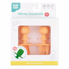Load image into Gallery viewer, Bumkins Silicone Chewtensils®: Tangerine are shown in a white packaging box, with a clear front window displaying the product.
