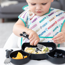Load image into Gallery viewer, A girl in a Mickey and Friends bib uses Bumkins Spoon + Fork: Mickey Mouse to scoop mac &amp; cheese with broccoli from a Mickey Mouse Grip Dish.
