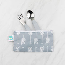 Load image into Gallery viewer, Bumkins Spoon + Fork: Gray peeks from a gray and white arrow-patterned pouch on a marble background.
