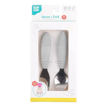 Load image into Gallery viewer, Bumkins Spoon + Fork: Gray is shown in a white packaging box with a clear front window displaying the set of utensils.
