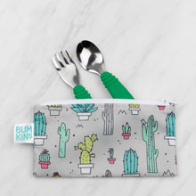 Load image into Gallery viewer, Bumkins Spoon + Fork: Jade peeks out from a gray cactus-patterned pouch on a marble background.
