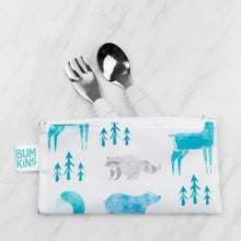 Load image into Gallery viewer, Bumkins Spoon + Fork: Marble peeks from a white animal-patterned pouch on a marble background.
